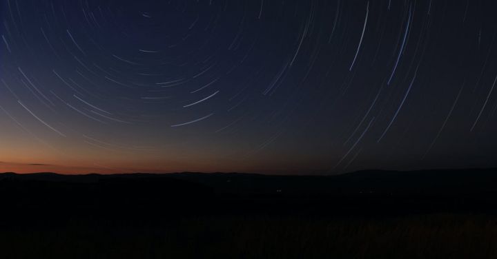 Nature Trails - Time-lapse Photography of Stars in Sky at Night