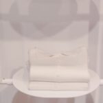 Shopping Spots - White Ceramic Toilet Bowl Beside White Textile