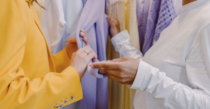 Shopping Spots - Man in White Dress Shirt Holding Hands With Woman in Yellow Dress